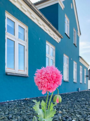 Det blågrønne Hus Hals